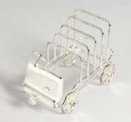 A SILVER PLATED OLD CAR FOUR-DIVISION TOAST RACK.