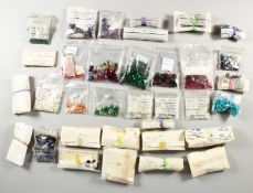 A LARGE COLLECTION OF SEMI-PRECIOUS STONES.