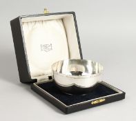 A CASED CIRCULAR SILVER BOWL. 4.24ins diameter. Sheffield 1937.