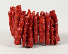 A CORAL FLEXIBLE BRACELET.