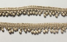 TWO ISLAMIC SILVER METAL BRACELETS.
