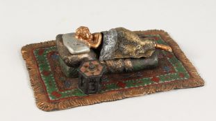 A VIENNA COLD CAST PAINTED BRONZE SLEEPING GIRL with loose blanket, her with no clothes. 6ins.