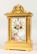 A LATE 19TH/EARLY 20TH CENTURY FRENCH GILT METAL MANTLE CLOCK, with eight-day movement striking on a