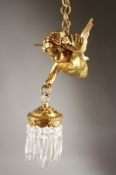 A GOOD BRONZE CUPID WALL LIGHT with cut prism drops.