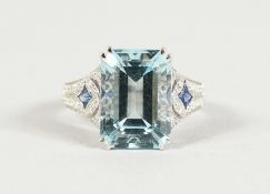A SUPERB 18CT WHITE GOLD, AQUAMARINE (7.5CTS) AND DIAMOND RING.