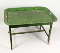 A LATE 19TH CENTURY GREEN PAINTED TOLEWARE TWIN HANDLED TRAY on a later stand. Tray 31ins x 22.