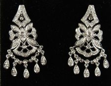 A PAIR OF WHITE GOLD DIAMOND DROP EARRINGS.