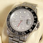 A ROLEX GMT MASTER II STAINLESS STEEL GENTLEMAN'S WRISTWATCH, the dial, case and strap inset with