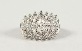 A SUPERB 14CT GOLD, MARQUISE AND ROUND CUT DIAMOND RING.