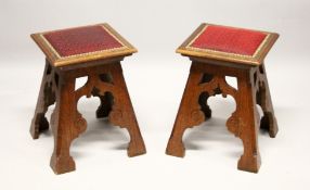 A GOOD PAIR OF OAK GOTHIC REVIVAL AESTHETIC MOVEMENT STOOLS, with upholstered square tops and