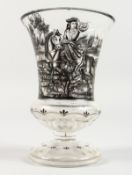 A GERMAN GLASS BEAKER painted with a hunting scene. 8.5ins high.