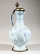 A CONTINENTAL TIN-GLAZED JUG, with hinged pewter cover and base. 10.5ins high.
