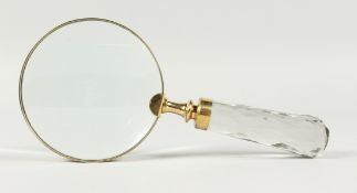 A MAGNIFYING GLASS WITH CRYSTAL HANDLE.