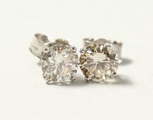 A PAIR OF WHITE GOLD DIAMOND STUD EARRINGS of 1.4cts.