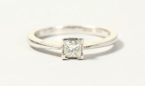 A PLATINUM SET PRINCESS CUT DIAMOND RING of 25 points.