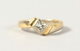 AN 18CT GOLD SOLITAIRE DIAMOND RING.