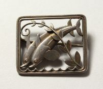A GEORG JENSEN SILVERSMITHS LTD 925 STERLING SILVER DOUBLE DOLPHIN BROOCH. 3.5cms x 3cms.