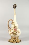 A DECORATED EWER SHAPED PORCELAIN AND GILT METAL MOUNTED LAMP BASE. 22ins high.