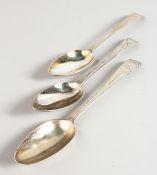 A PAIR OF IRISH SILVER TABLESPOONS, Dublin 1786; together with a similar spoon, London 1809, all