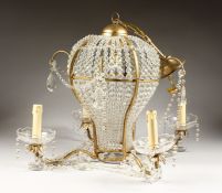 A HOT AIR BALLOON DESIGN CENTRE LIGHT, with four scrolling branches with beads and prism drops.