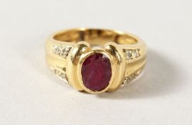 AN 18CT GOLD, RUBY AND DIAMOND RING.