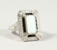 A SILVER GILSON OBLONG OPAL DECO STYLE RING.