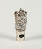A CAST SILVER BEAR WHISTLE.