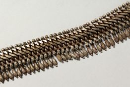 AN ISLAMIC SILVER METAL CHAIN.