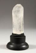 A ROCK CRYSTAL SPECIMEN on an ebonised stand. 6.5ins high inc. stand.