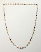 A GOOD 18CT YELLOW GOLD GEM SET NECKLACE.