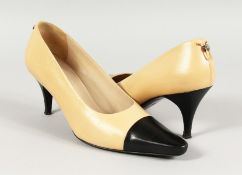 A PAIR OF CHANEL, SIZE 39.5, TWO-COLOUR LEATHER SHOES.
