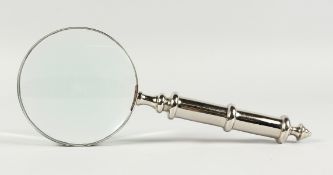 A MAGNIFYING GLASS WITH CHROME HANDLE.
