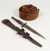 A WWII ISSUE FAIRBAIRN-SYKES COMMANDO DAGGER with chequered grip, plain oval disc guard stamped with