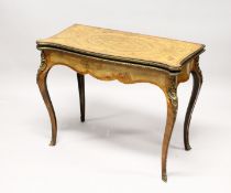 A GOOD VICTORIAN FIGURED WALNUT CARD TABLE, with quartered marquetry inlaid folding top, opening