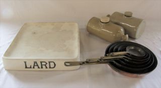 Set of copper pans, hot water bottles and a lard slab