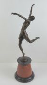 A superb Art Deco dancing girl bronze signed Bzach to the base and raised on a conical rouge marble