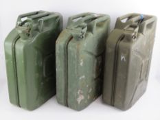 Three 20L 'Jerry' petrol cans, dated 1980 and 1988 respectively, one undated.