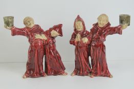 A pair of 19th century Austrian candlesticks having a pair of Monks on right side (as you look)