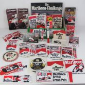 The Marlboro Challenge box containing a quantity of Marlboro Challenge ephemera including; stickers,