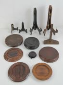 A quantity of assorted turned wooden stands, plate racks etc.