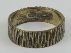 A 9ct gold ring having bark effect and hallmarked London, size M, 3.9g.