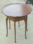 Art Nouveau: a Liberty style circa 1900 six leg inlaid Mahogany table,