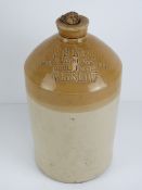 A two tone salt glazed stoneware advertising flagon; 'WS Neal Wine & Spirit Merchant, BELL HOTEL,