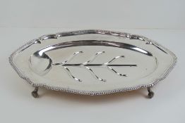 A large and impressive silver plated Mappin & Webb meat platter with draining channels,