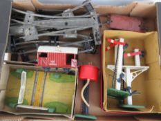 A quantity of Hornby Meccano clockwork tin plate O gauge train track including a boxed No1 level