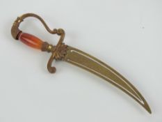 A 19 th century agate handled gilded paper knife and paper clip in the form of a sabre / sword ,