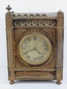 Gothic Revival Ting Tang clock: a gilt and carved wooden cased 'W & H' (Winterhalder and Hofmeier)