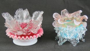 Table top garden fairy lights: one with a vaseline edged petal type on a clear over sky blue,