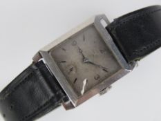 Tank cased steel wrist watch: a c1950 steel cased gents STAYTE mechanical wristwatch with leather