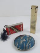 A novelty cigarette case in the form of a camera, together with a vintage mirrored compact a/f,